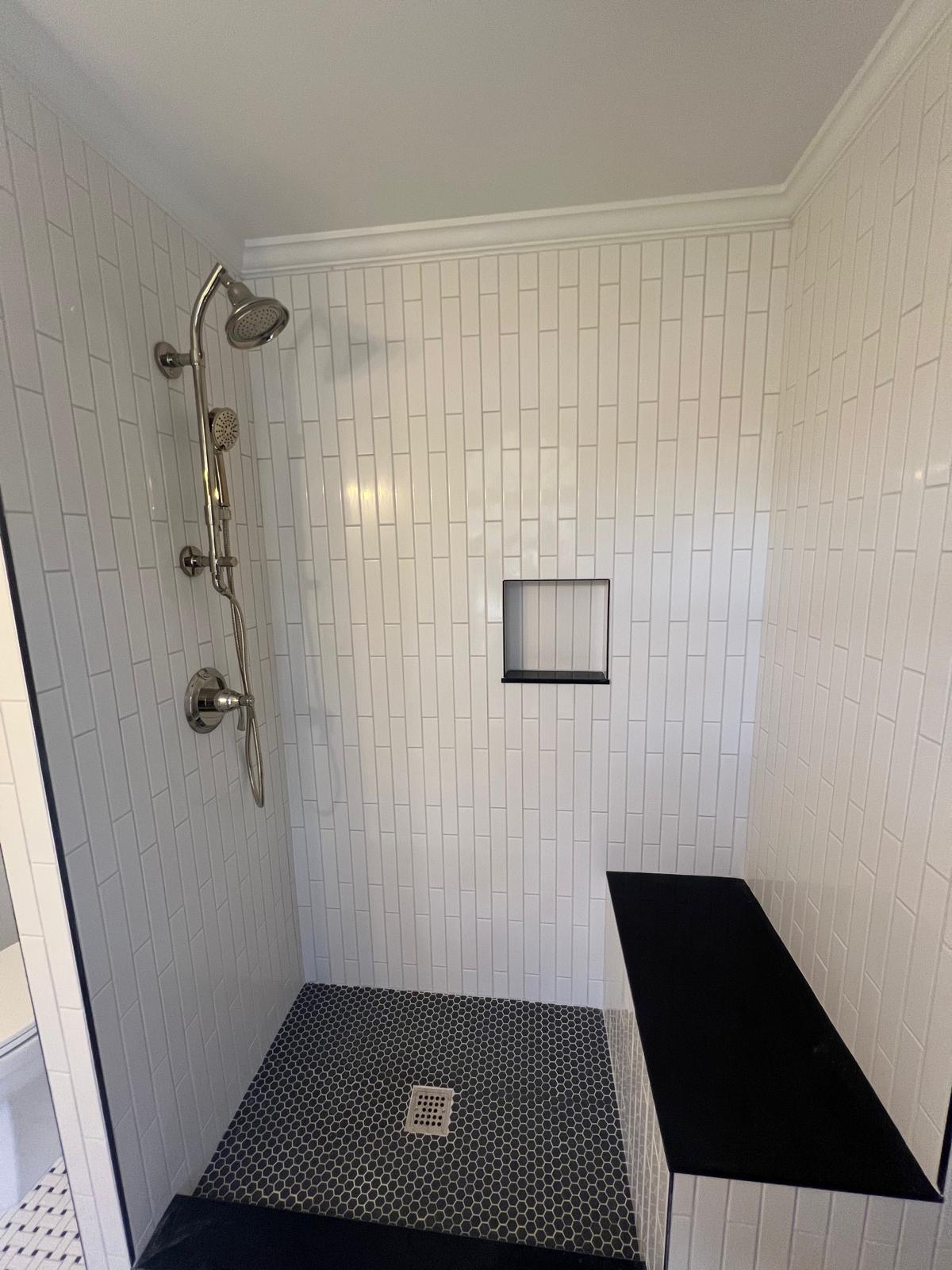 Walk-in tile shower with bench – JRM Plumbing Raleigh NC